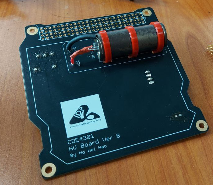 Cable tie securing GM tube to PCB